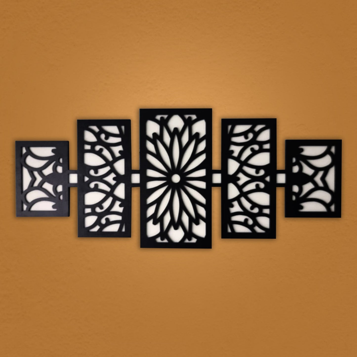 modern wooden wall art panel set – laser cut floral pattern displayed above a modern sofa in a stylish living room.